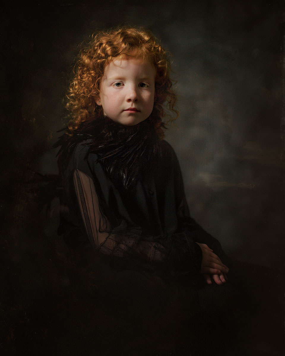 Canon fine art Portrait of a young curly red child photographed in the spirit of Rembrandt van Rhijn and with a sky of Gerard Dou by Willie Kers from Apeldoorn